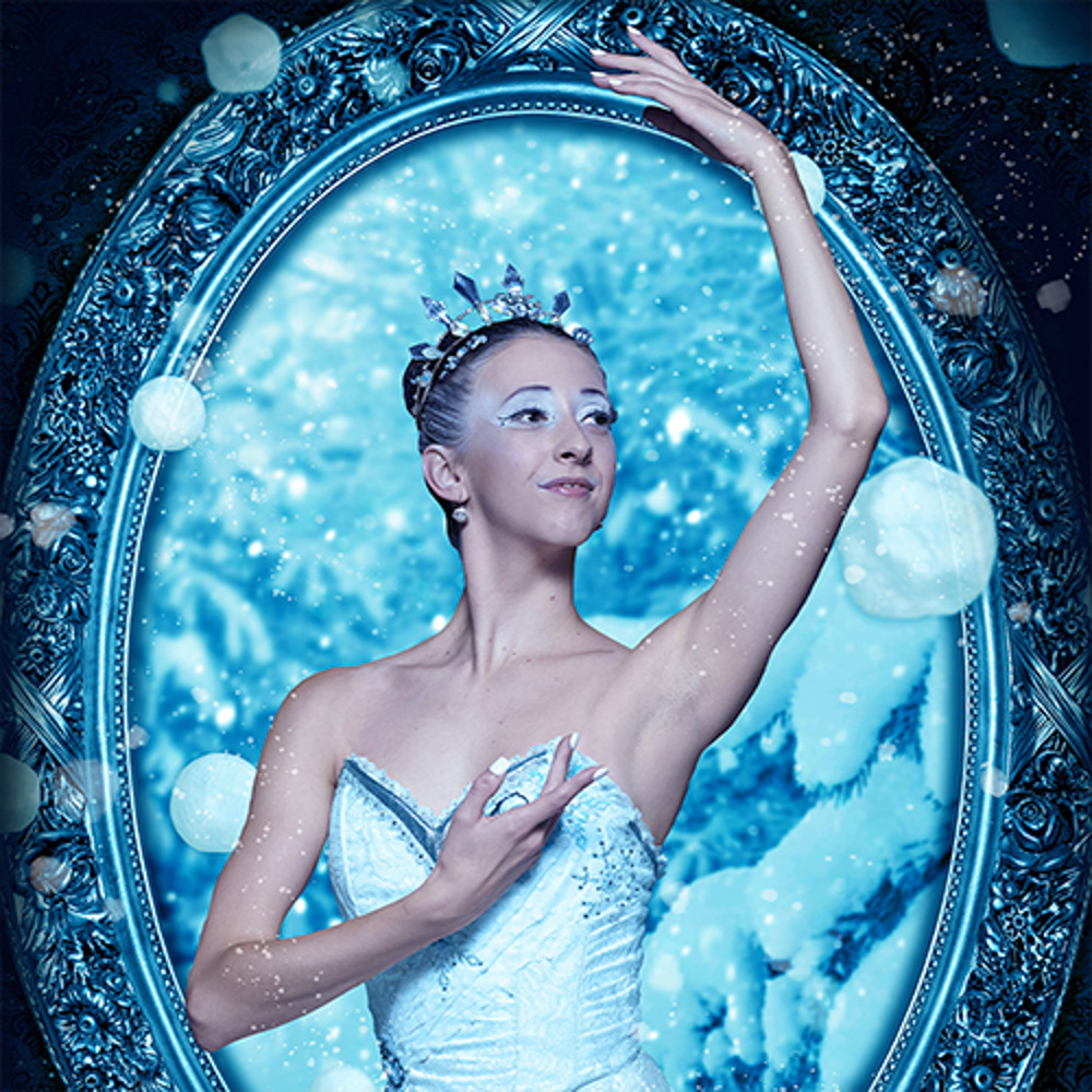 A dancer in a white costume and crown poses gracefully in front of a snowy forest background framed by an ornate blue oval.